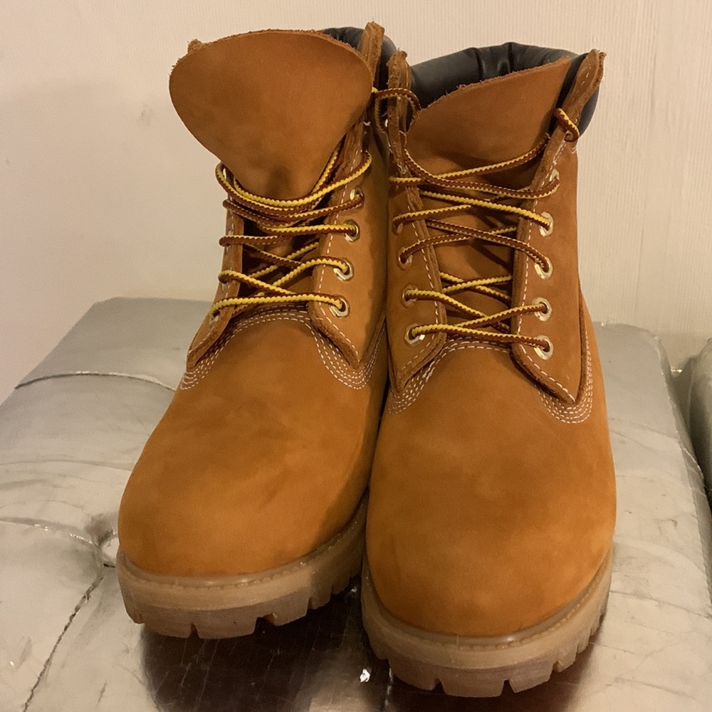TIMBERLAND tan boots with brown leather on top of boots size 8.5. - Picture 1 of 9